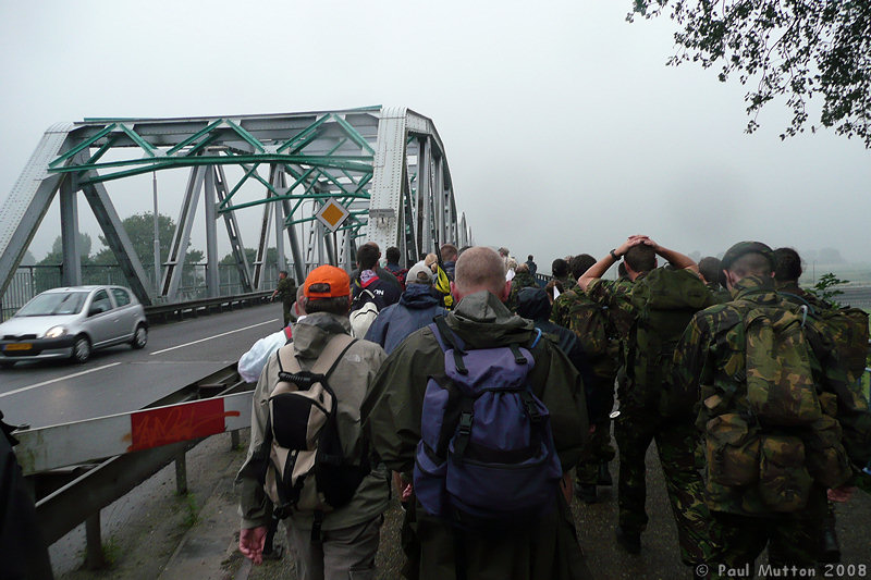 P1000676 Marching through fog over bridge